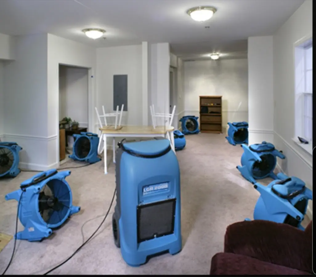 Air movers and dehumidifier setup for Water Extraction & Removal in Chesterland